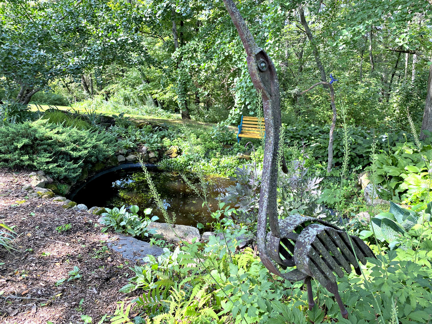 2109 Paulsen Road Harvard, IL 60033 - Photo 65 of 76 a view of a garden with plants and large trees