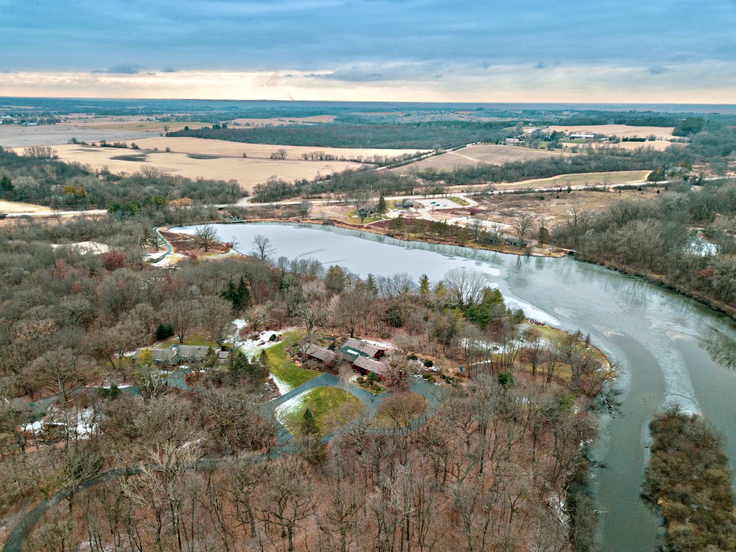 2109 Paulsen Road Harvard, IL 60033 - Photo 72 of 76 a view of a lake with lots of residential buildings