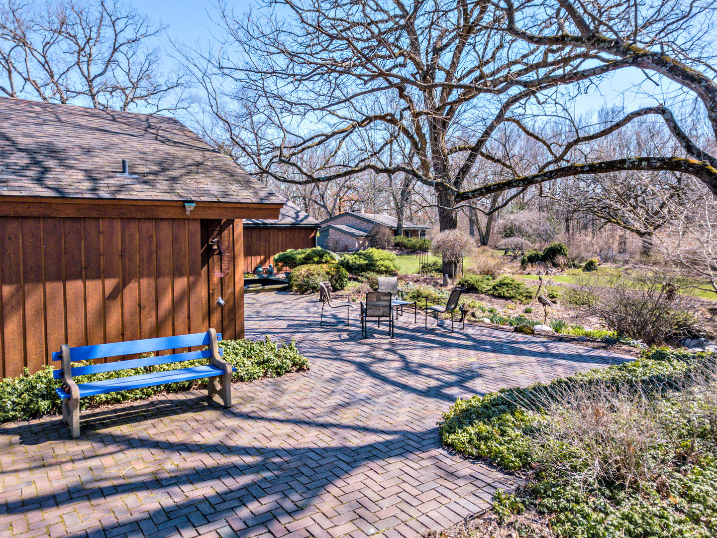 2109 Paulsen Road Harvard, IL 60033 - Photo 73 of 76 a street view with sitting space and covered trees