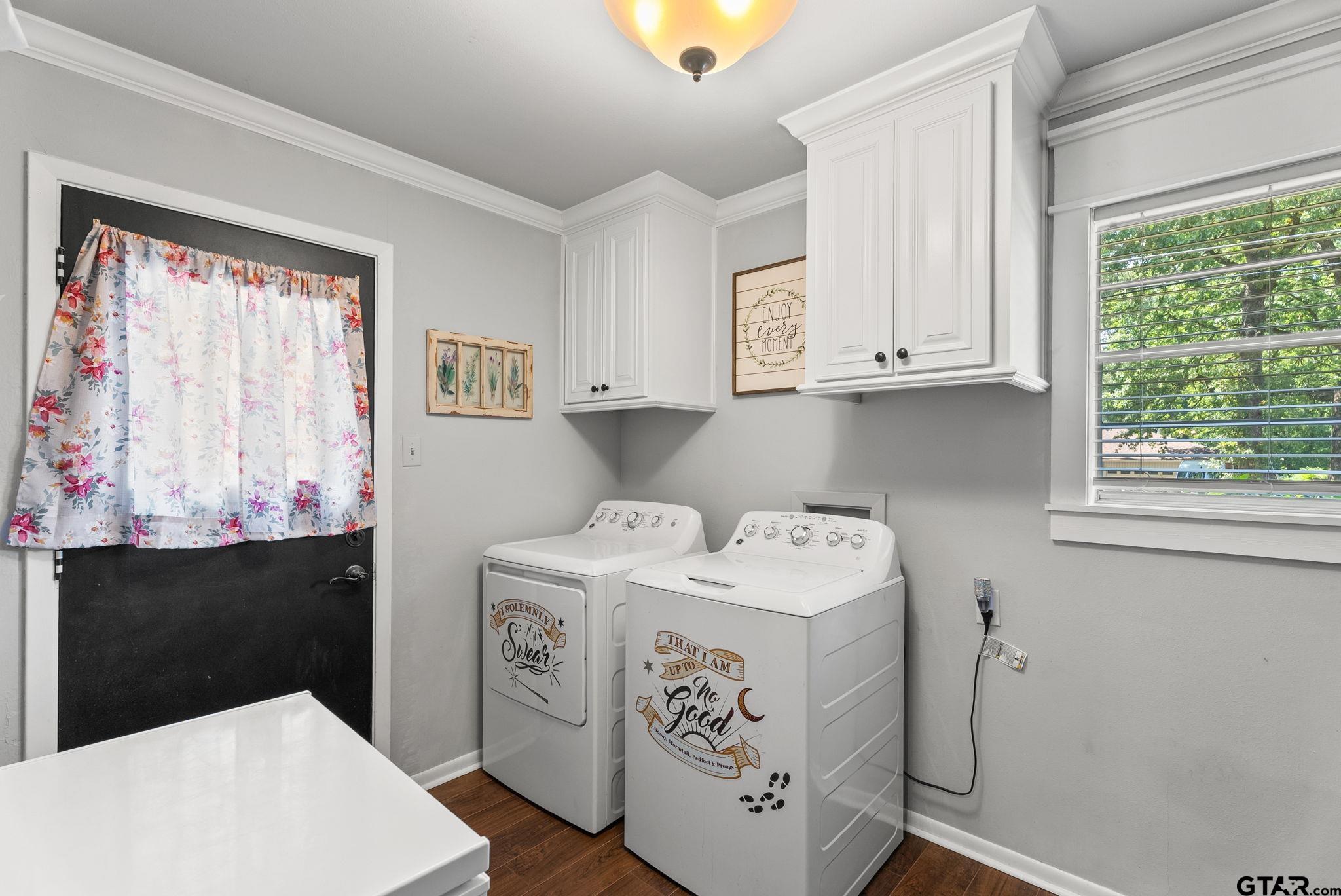 3200 Charron Avenue Longview, TX 75601 - Photo 25 of 34 a utility room with dryer washer and a window
