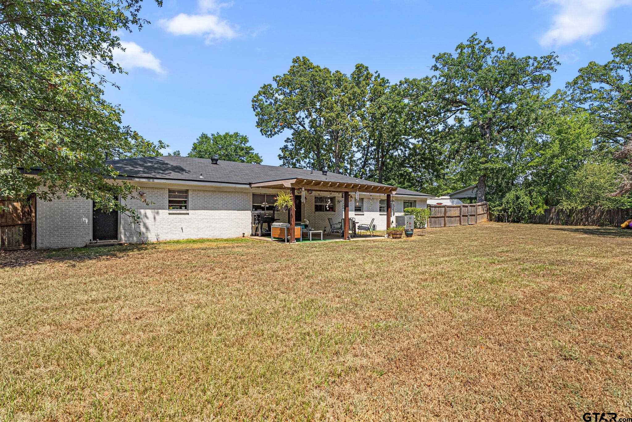 3200 Charron Avenue Longview, TX 75601 - Photo 30 of 34 front view of a house with a yard