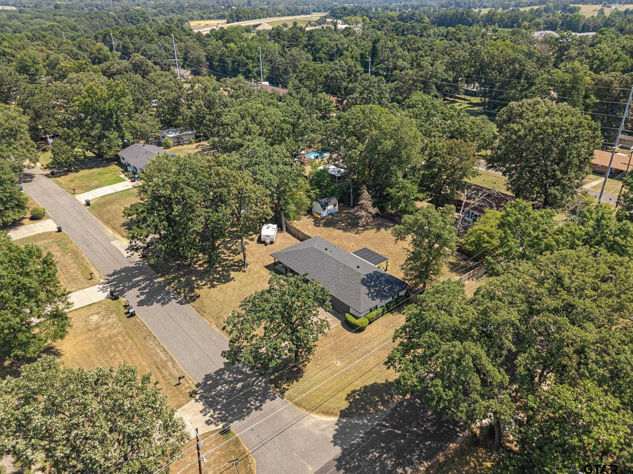 3200 Charron Avenue Longview, TX 75601 - Photo 34 of 34 an aerial view of a house with a yard