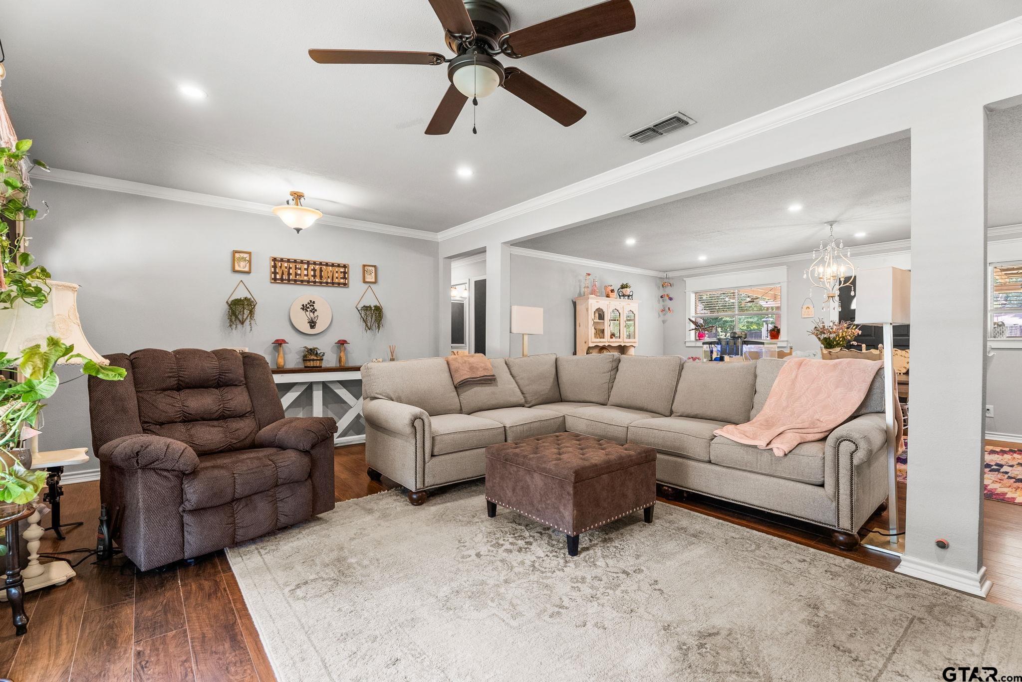 3200 Charron Avenue Longview, TX 75601 - Photo 4 of 34 a living room with furniture and a ceiling fan