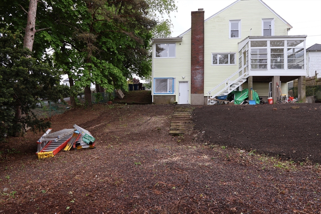 331 Proctor Avenue Revere, MA 02151 - Photo 28 of 29 a front view of a house with a yard