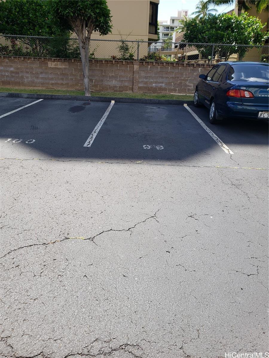 5122 Likini Street, Unit 716 Honolulu, HI 96818 - Photo 7 of 9 a view of swimming pool outdoor seating