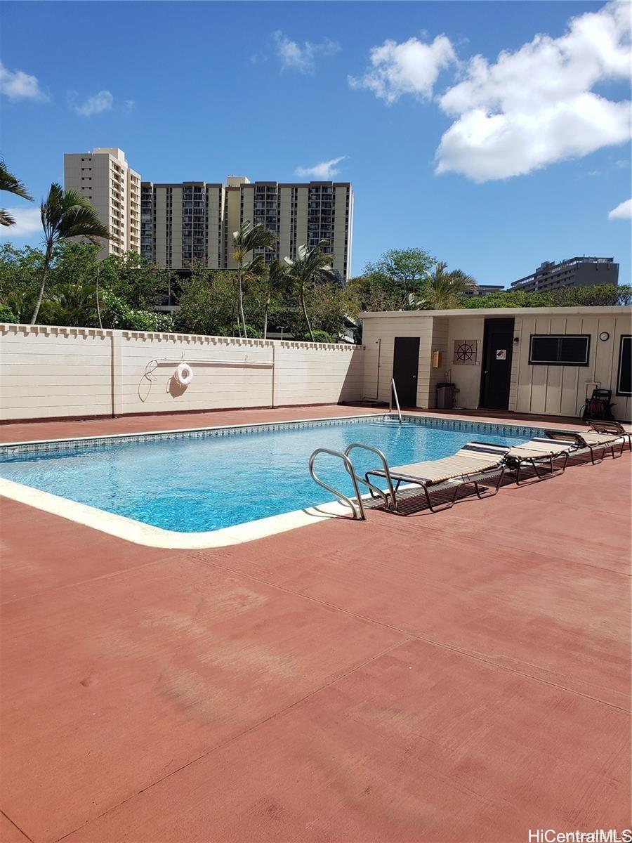 5122 Likini Street, Unit 716 Honolulu, HI 96818 - Photo 8 of 9 a view of a house with backyard and sitting area
