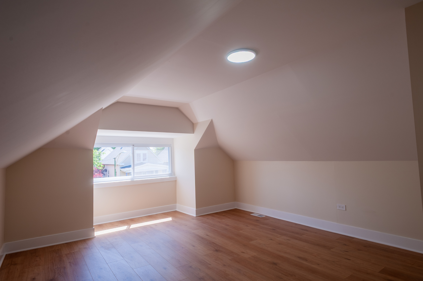 8620 South Union Avenue Chicago, IL 60620 - Photo 37 of 41 an empty room with wooden floor and windows