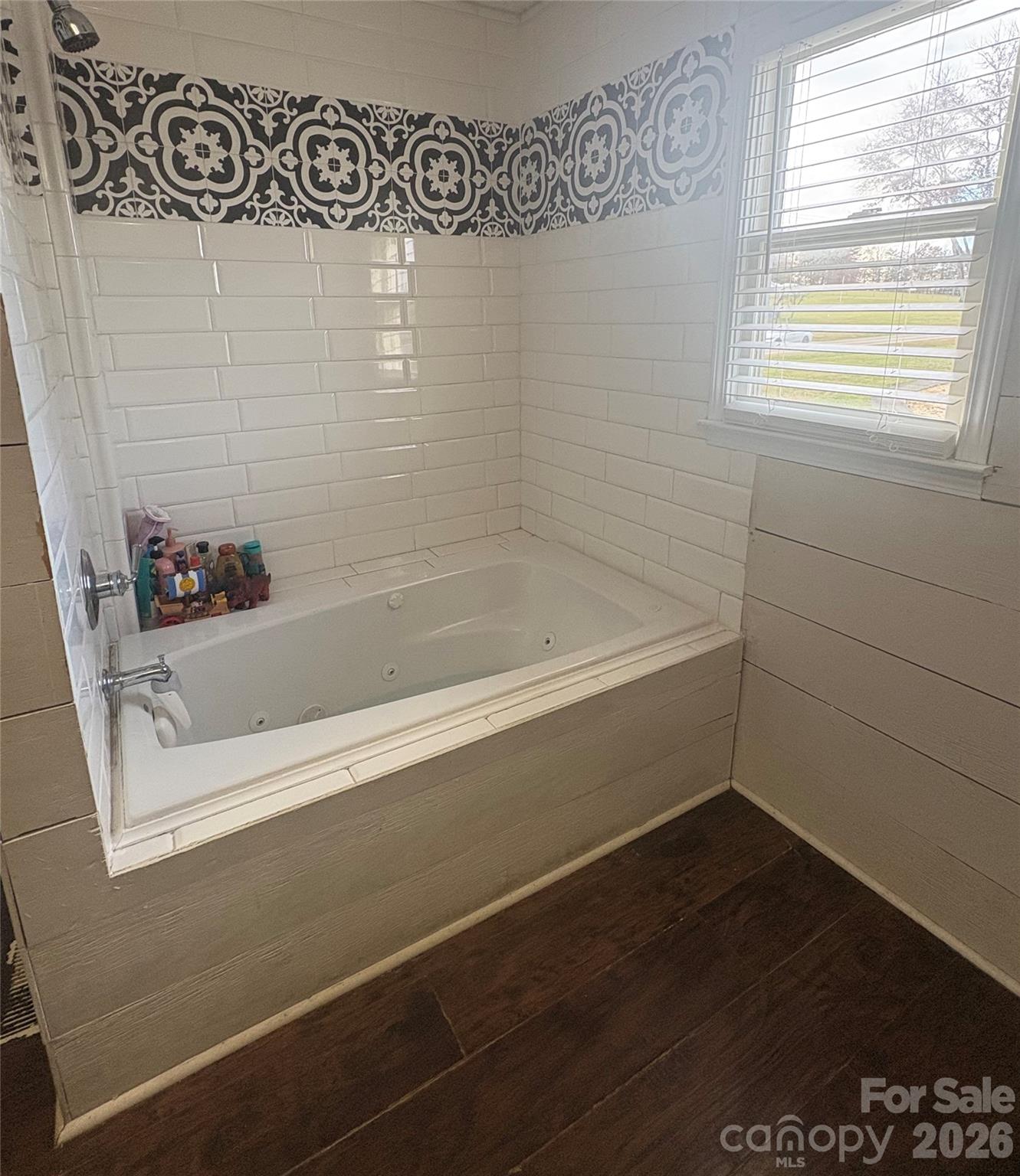 4132 Lower Cedar Valley Road Hudson, NC 28638 - Photo 4 of 5 a bathroom with a bathtub
