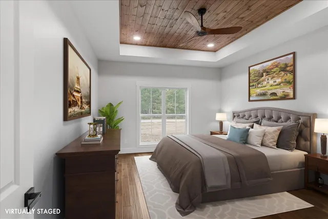 a bedroom with bed and window