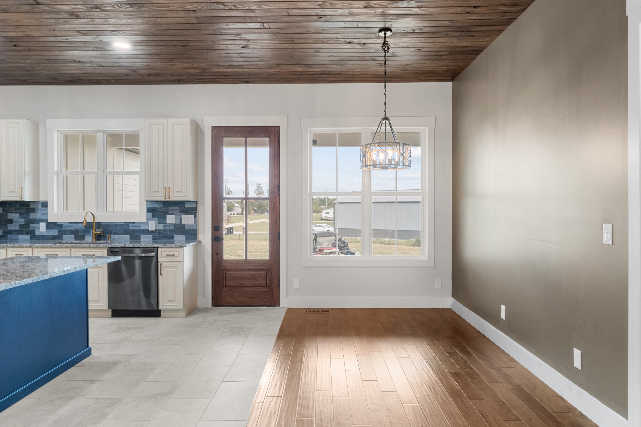 136 Summer Lk Drive Summertown, TN 38483 - Photo 18 of 48 a kitchen with a refrigerator a sink and dishwasher with wooden floor