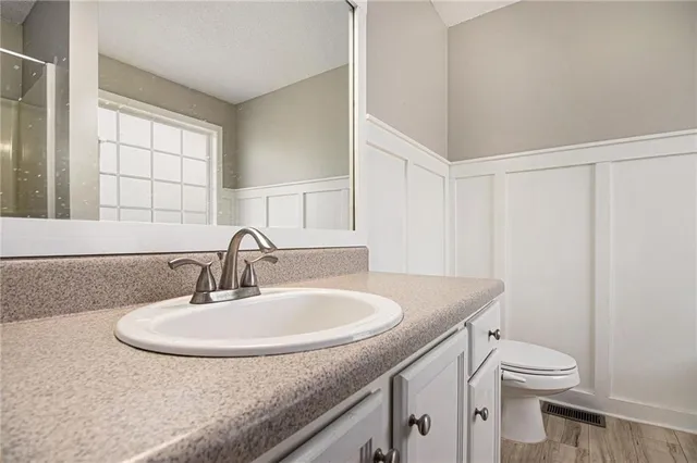 a bath tub sitting next to a window