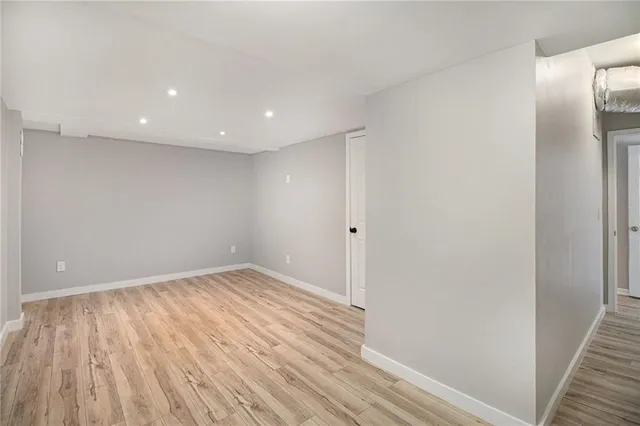 a view of a backyard with wooden floor