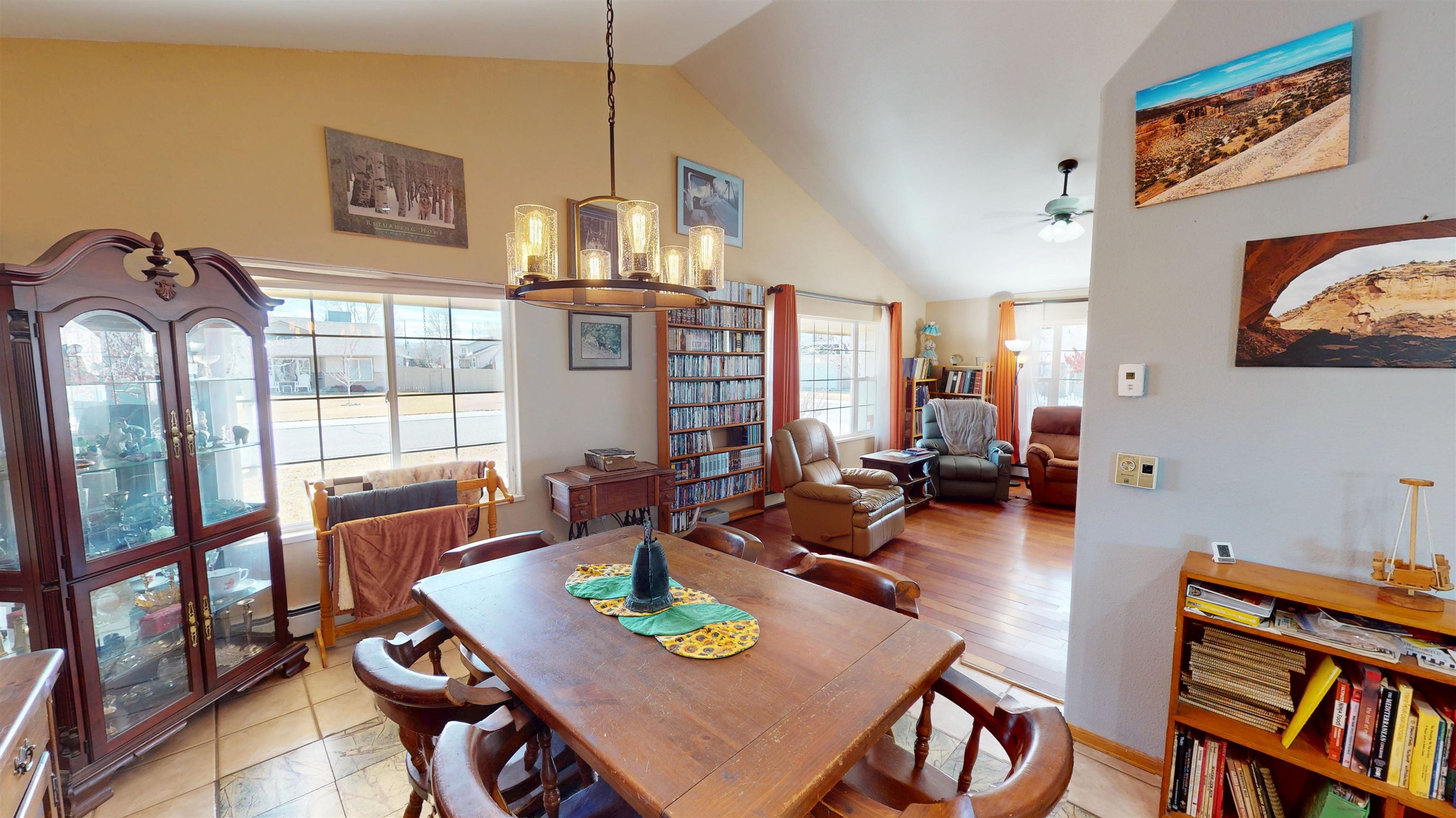307 Elderberry Drive Fruita, CO 81521 - Photo 11 of 42 a view of a dining room with furniture window and wooden floor