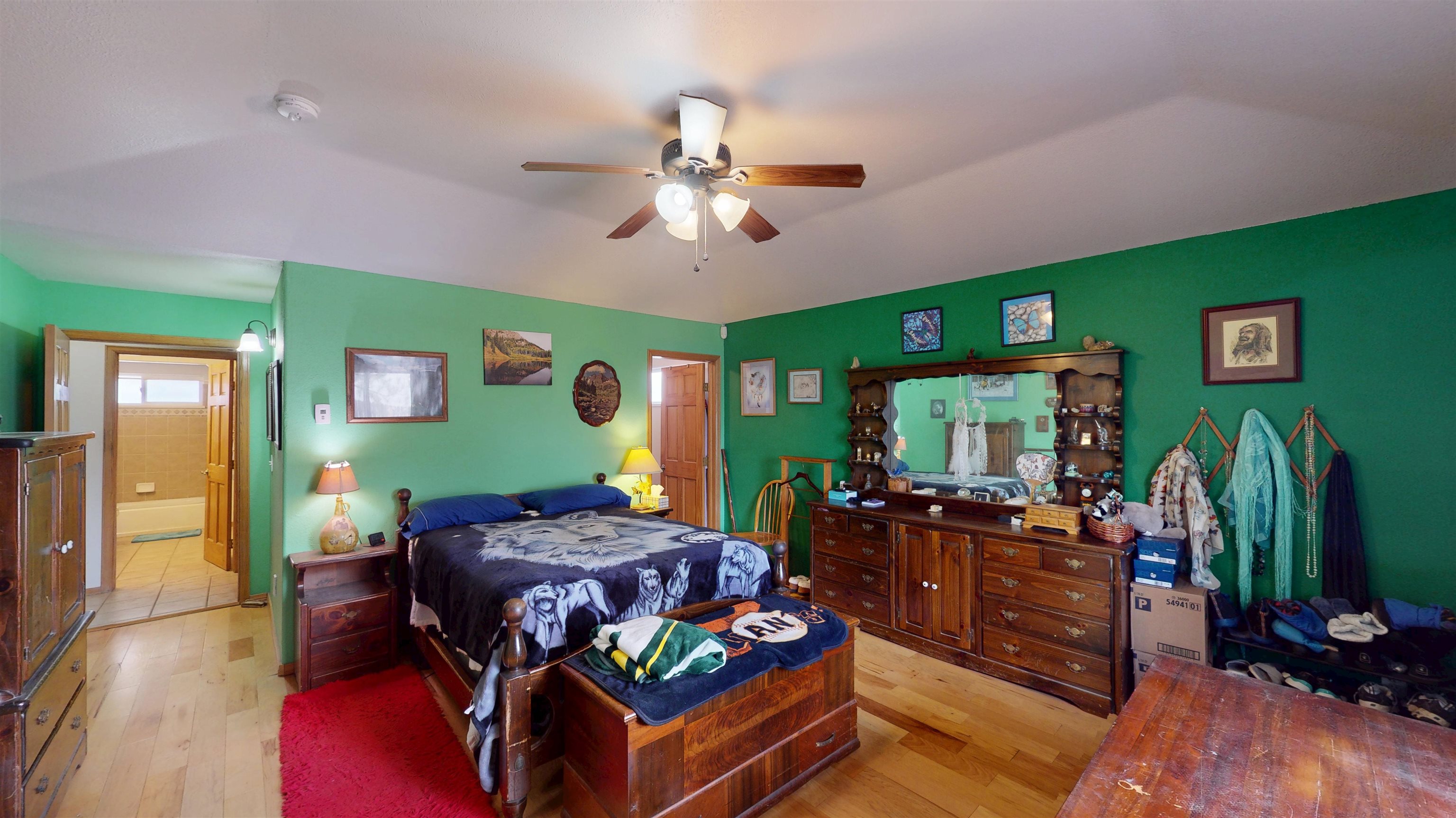 307 Elderberry Drive Fruita, CO 81521 - Photo 17 of 42 a living room with furniture and a flat screen tv