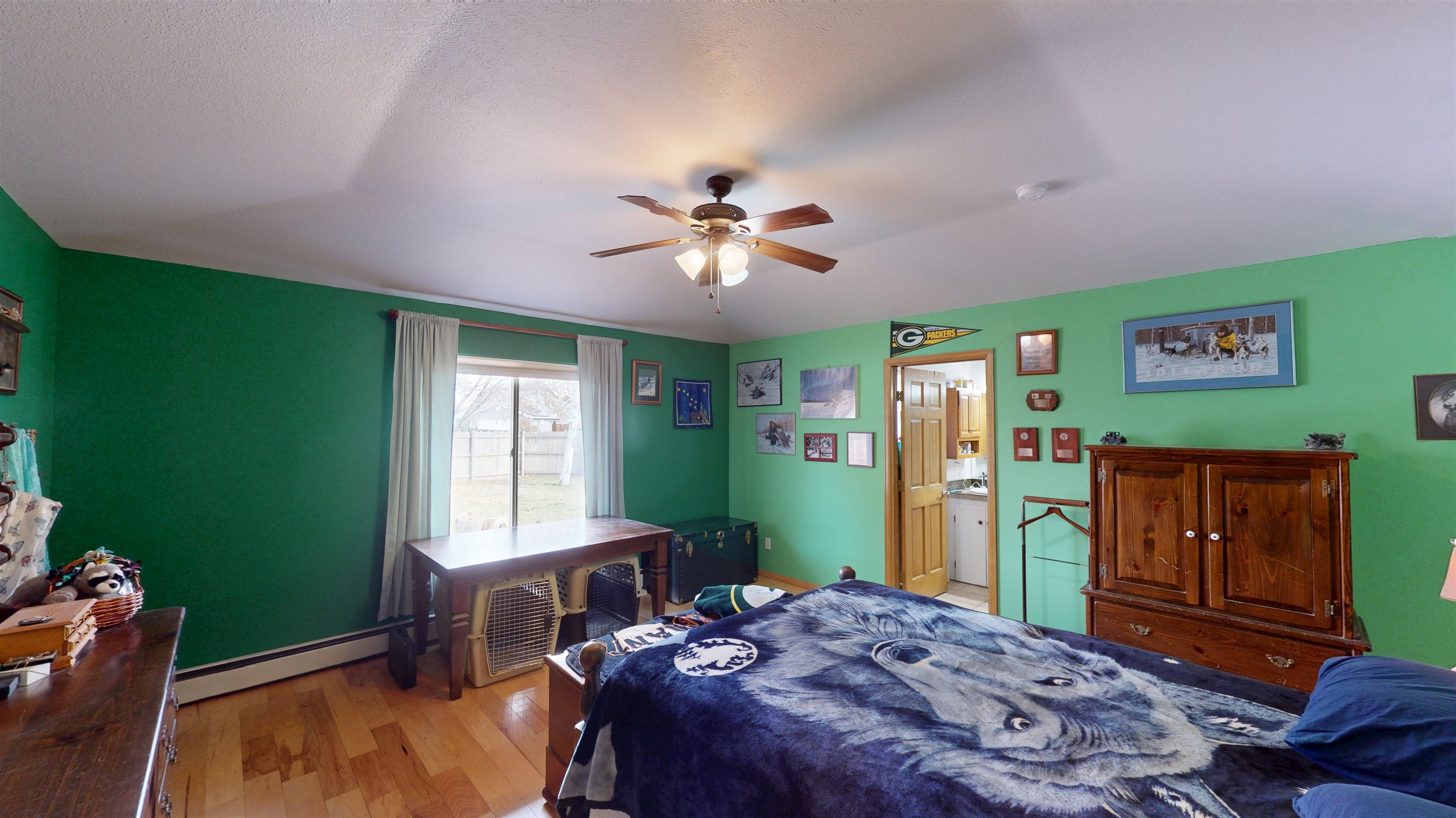 307 Elderberry Drive Fruita, CO 81521 - Photo 19 of 42 a bedroom with a bed and a window
