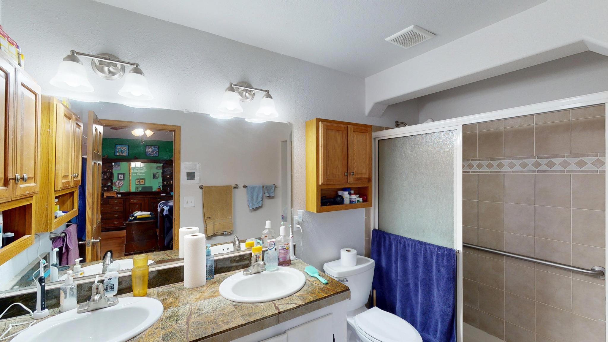 307 Elderberry Drive Fruita, CO 81521 - Photo 20 of 42 a kitchen with stainless steel appliances granite countertop a refrigerator and a sink