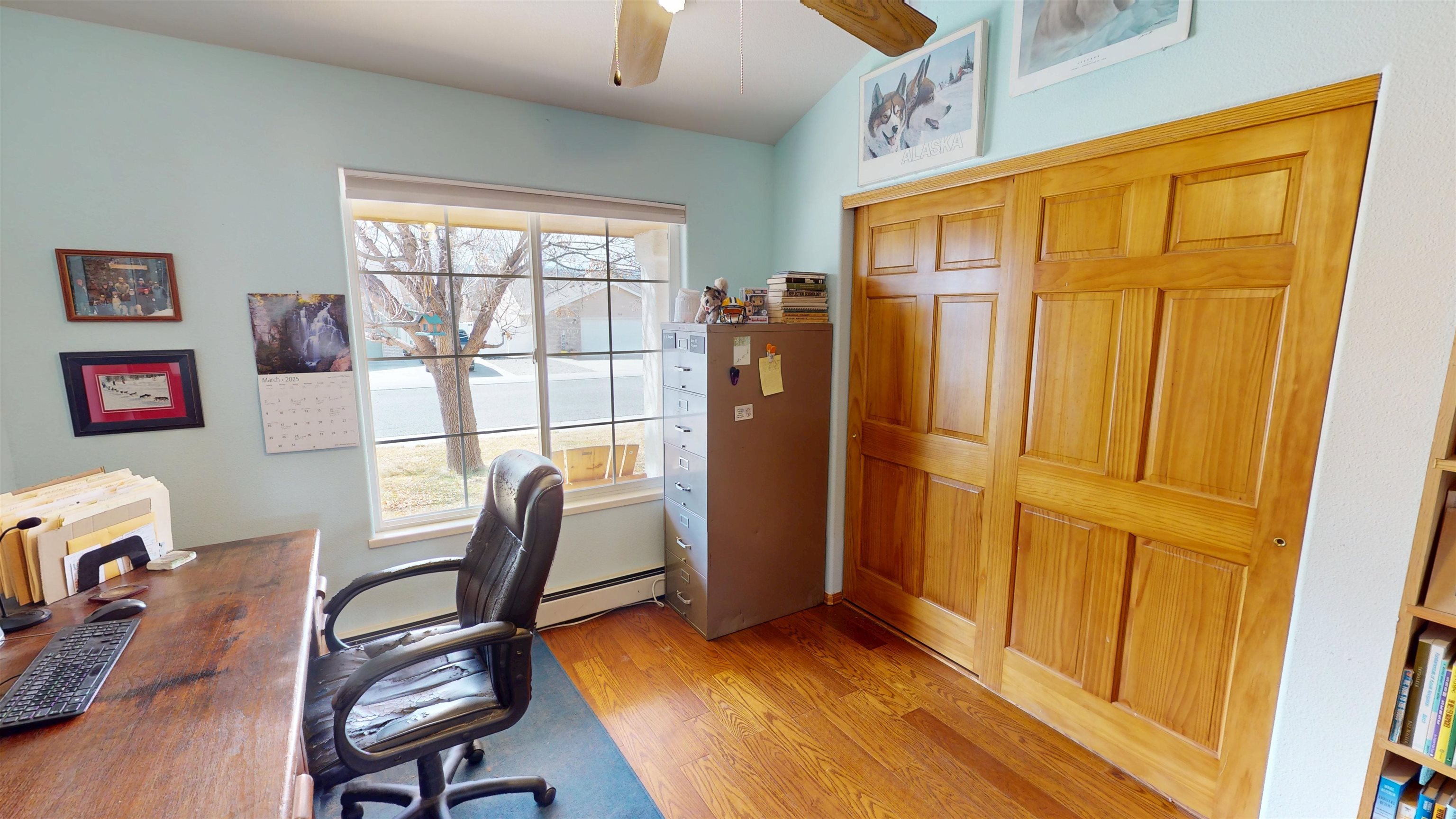 307 Elderberry Drive Fruita, CO 81521 - Photo 24 of 42 a view of a workspace with furniture and a window
