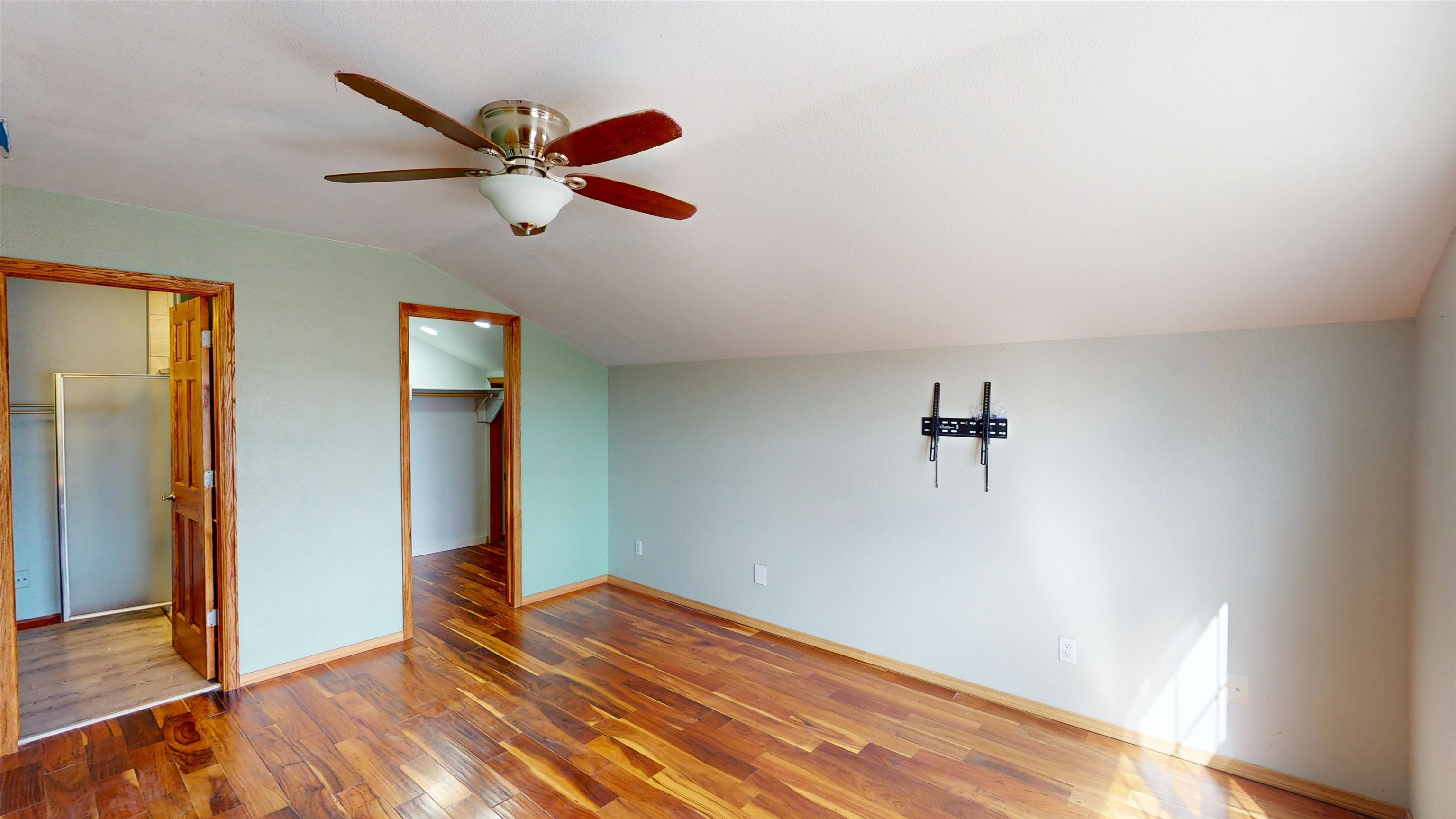 307 Elderberry Drive Fruita, CO 81521 - Photo 25 of 42 a view of empty room with wooden floor