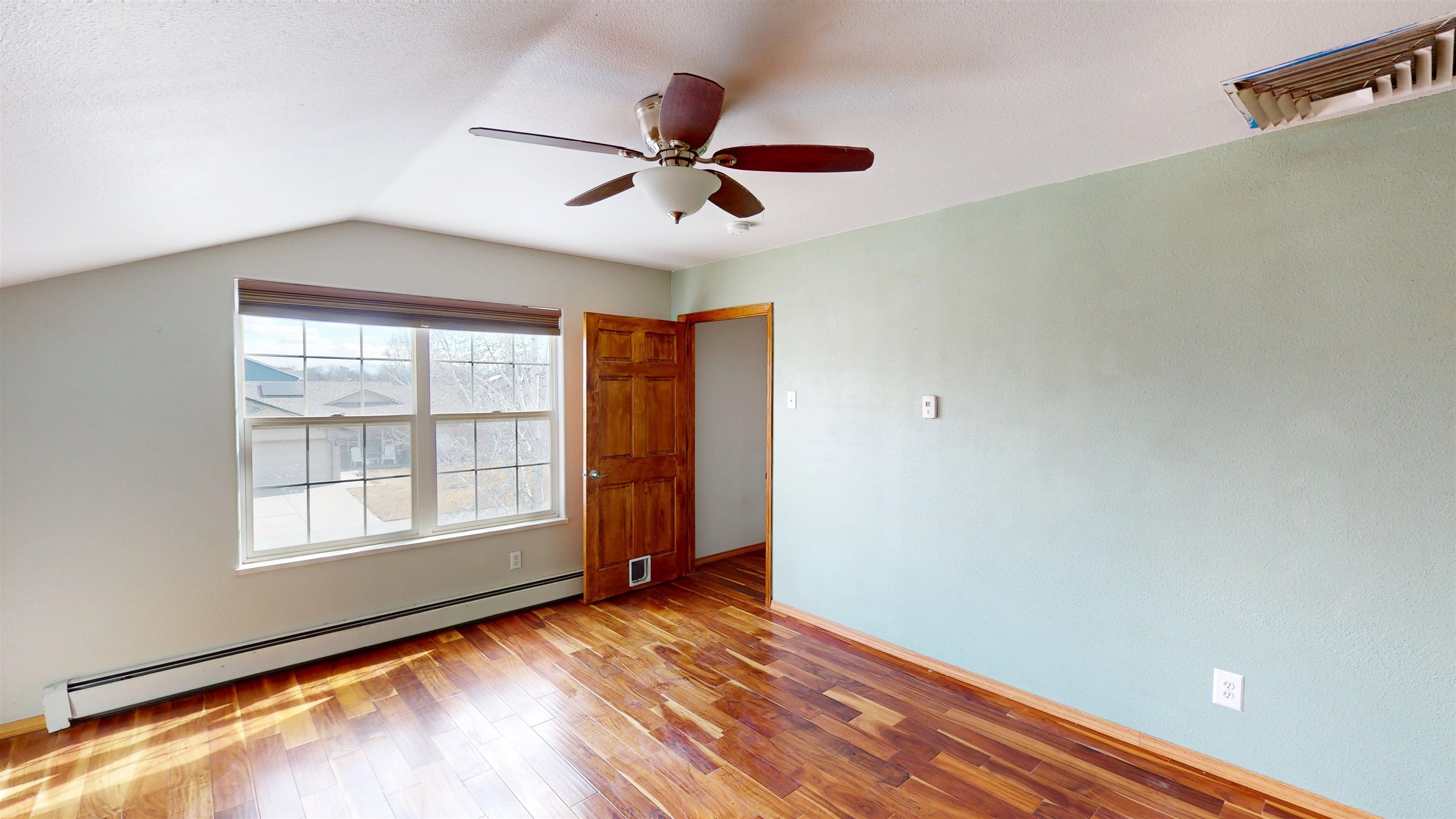 307 Elderberry Drive Fruita, CO 81521 - Photo 26 of 42 a view of an empty room with a window