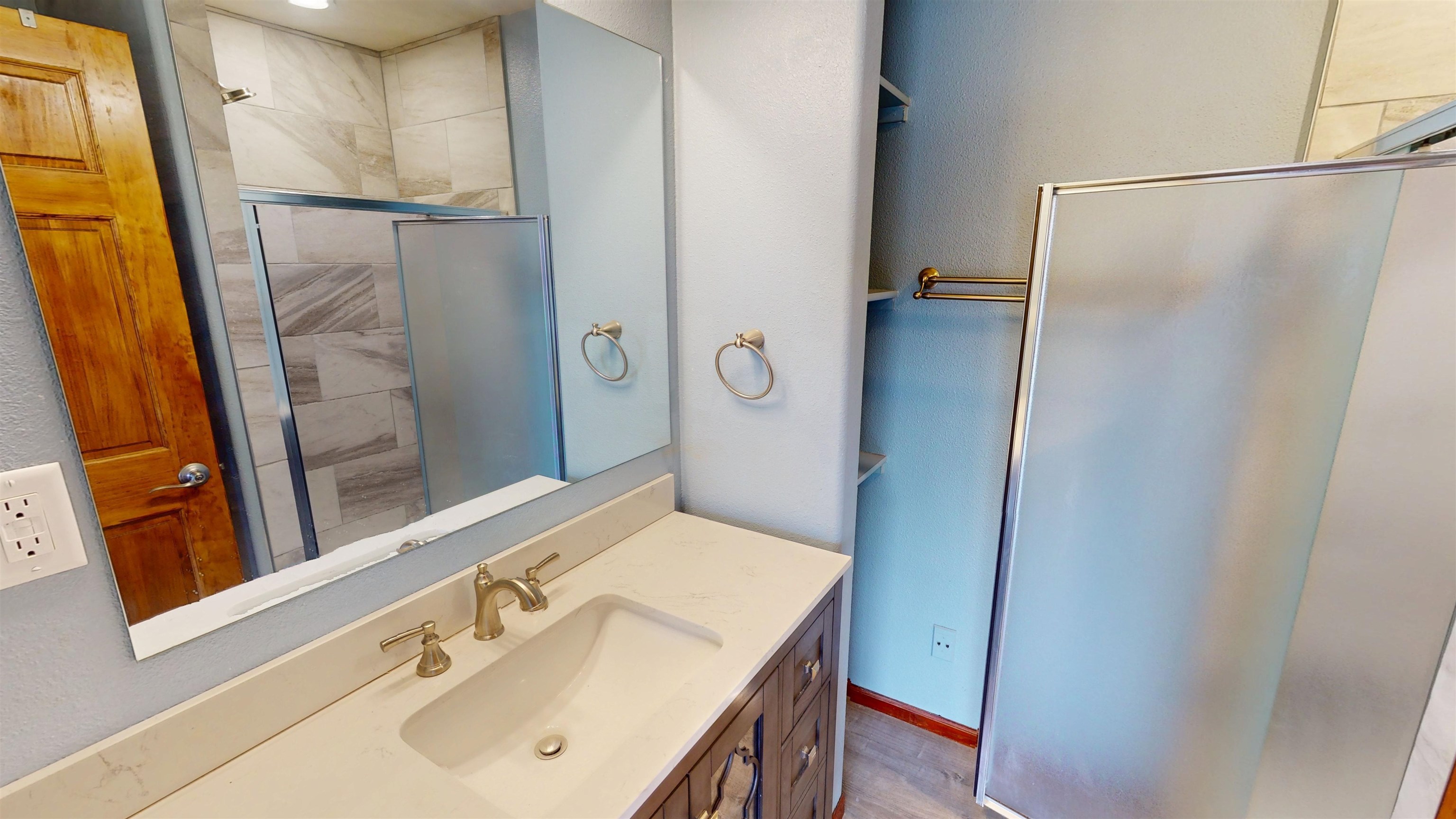 307 Elderberry Drive Fruita, CO 81521 - Photo 27 of 42 a bathroom with a sink and a mirror