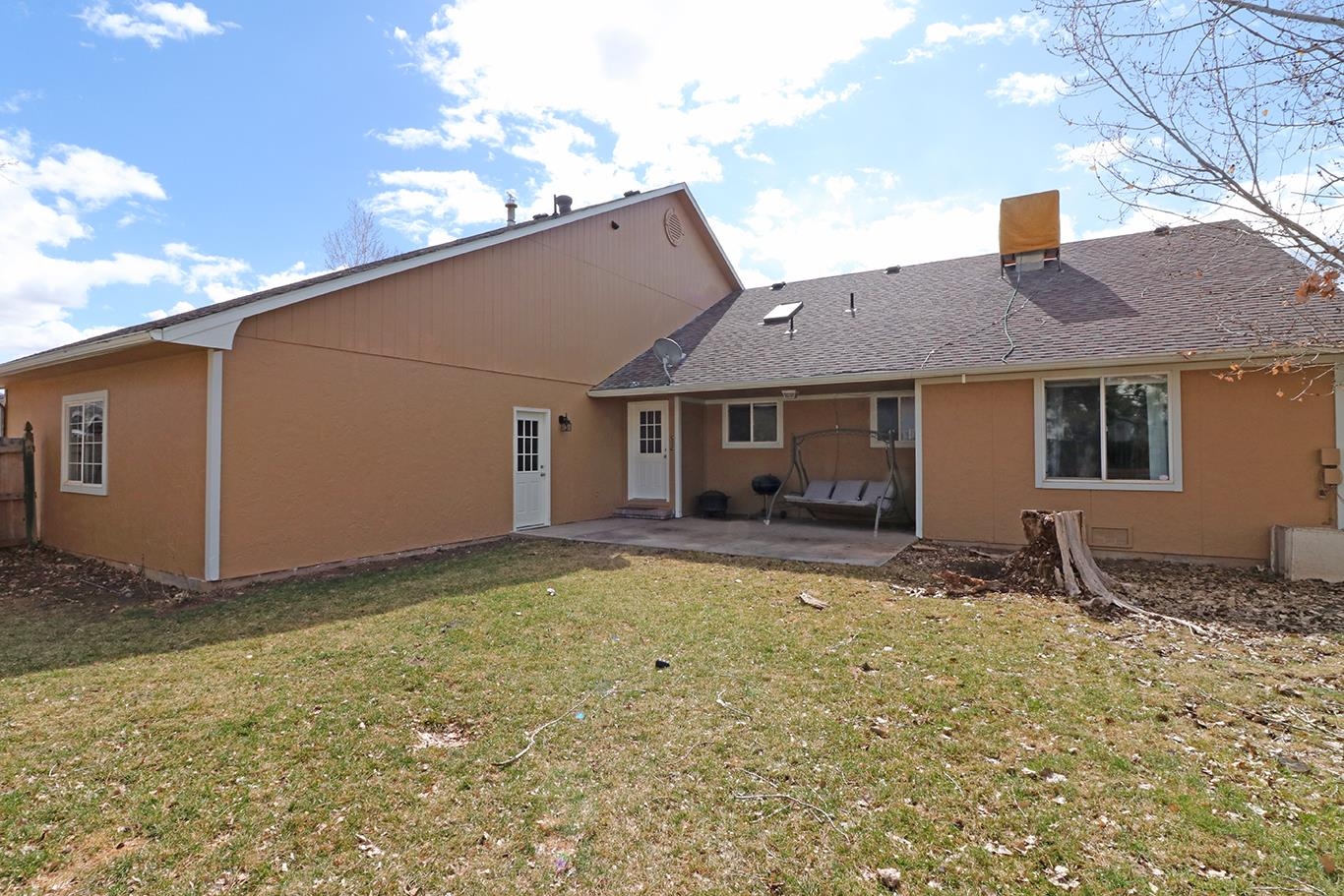 307 Elderberry Drive Fruita, CO 81521 - Photo 29 of 42 a house view with a sitting space and garden