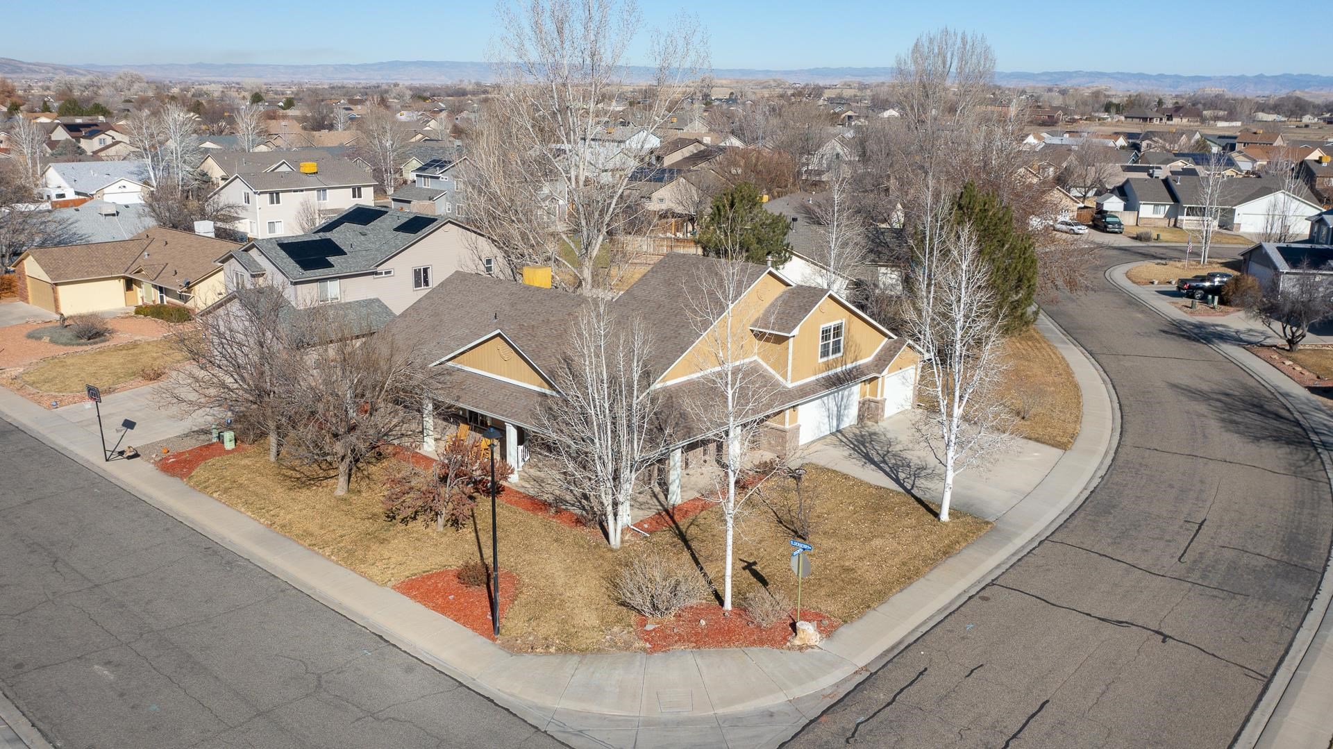 307 Elderberry Drive Fruita, CO 81521 - Photo 32 of 42 an aerial view of a house with a swimming pool