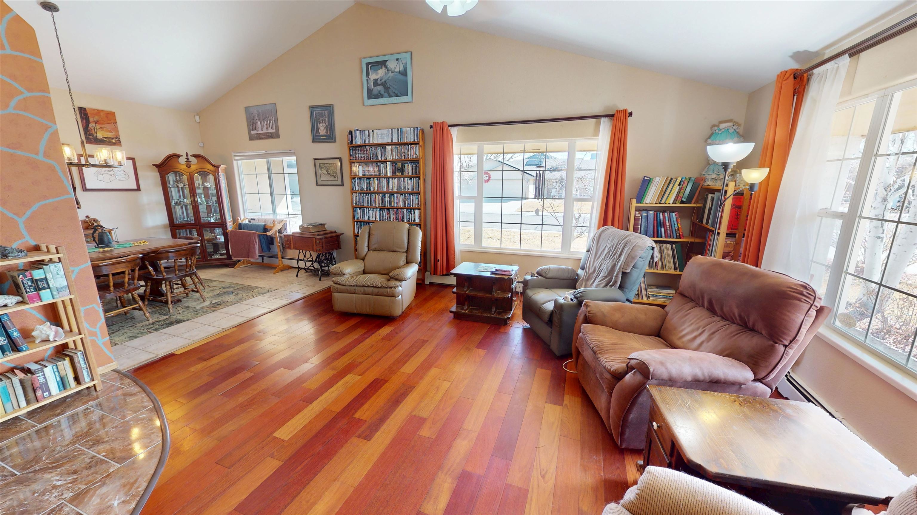 307 Elderberry Drive Fruita, CO 81521 - Photo 4 of 42 a living room with furniture a rug and a large window