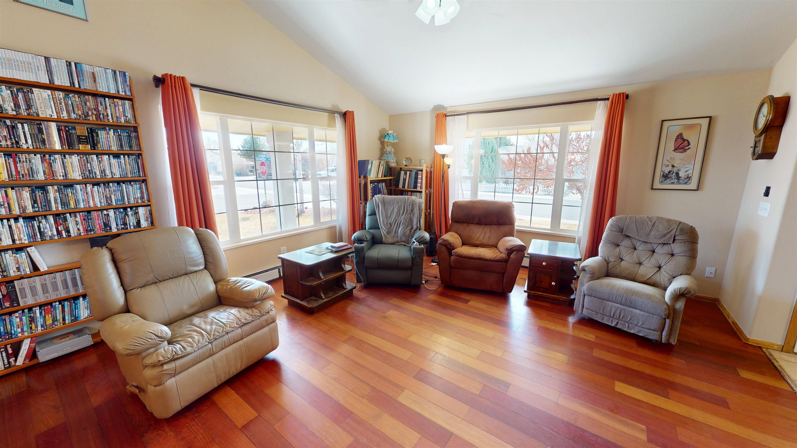 307 Elderberry Drive Fruita, CO 81521 - Photo 5 of 42 a living room with furniture and a large window