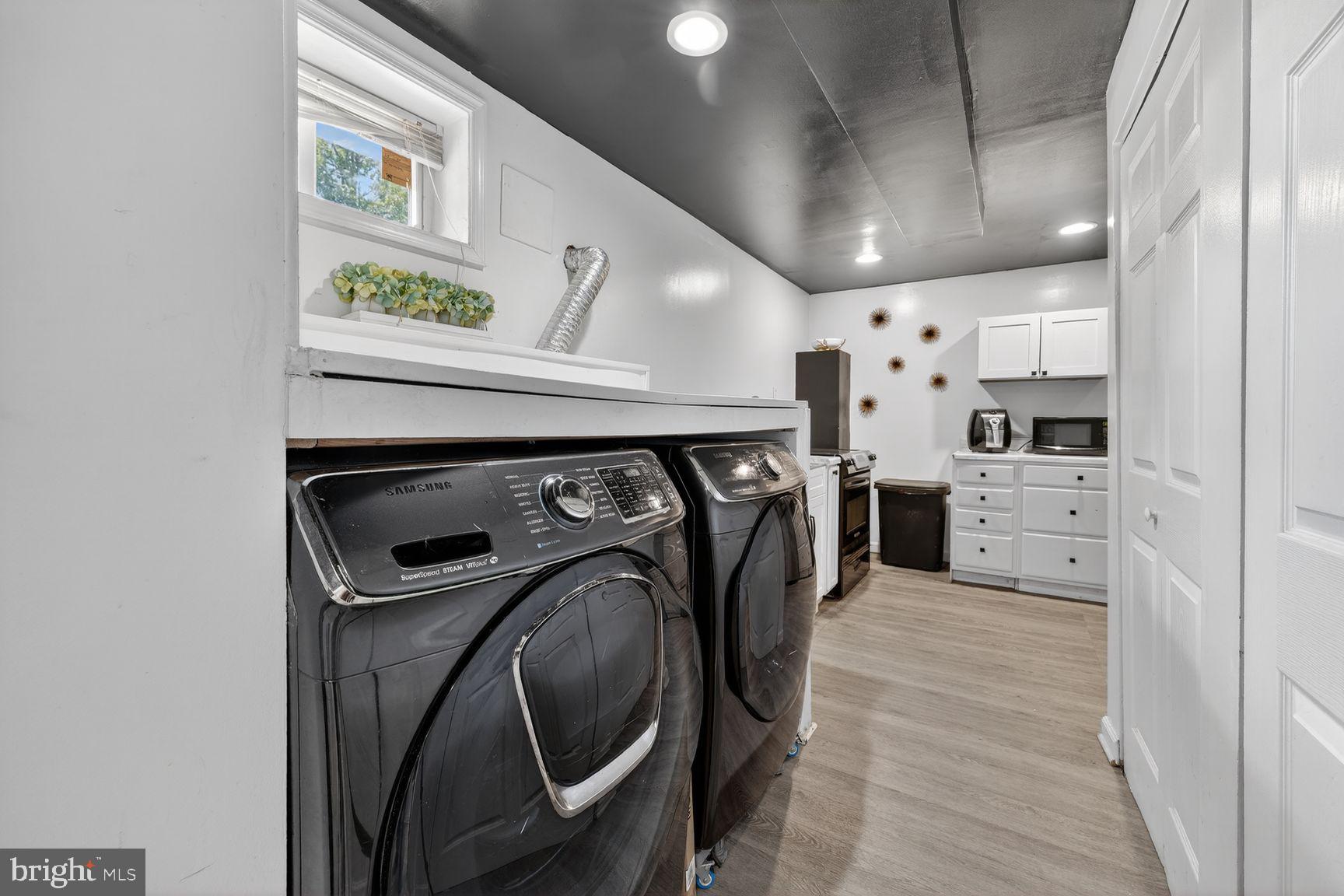 1104 Caddington Avenue Silver Spring, MD 20901 - Photo 24 of 35 a utility room with stainless steel appliances washer and dryer