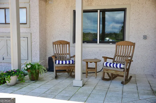 a backyard of a house with seating space