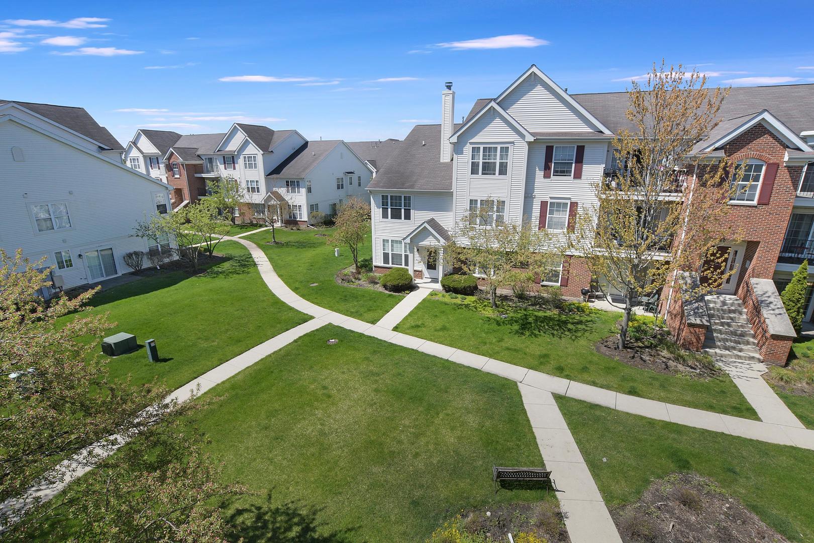 670 Mill Circle, Unit 3005 Wheeling, IL 60090 - Photo 10 of 22 an aerial view of a house