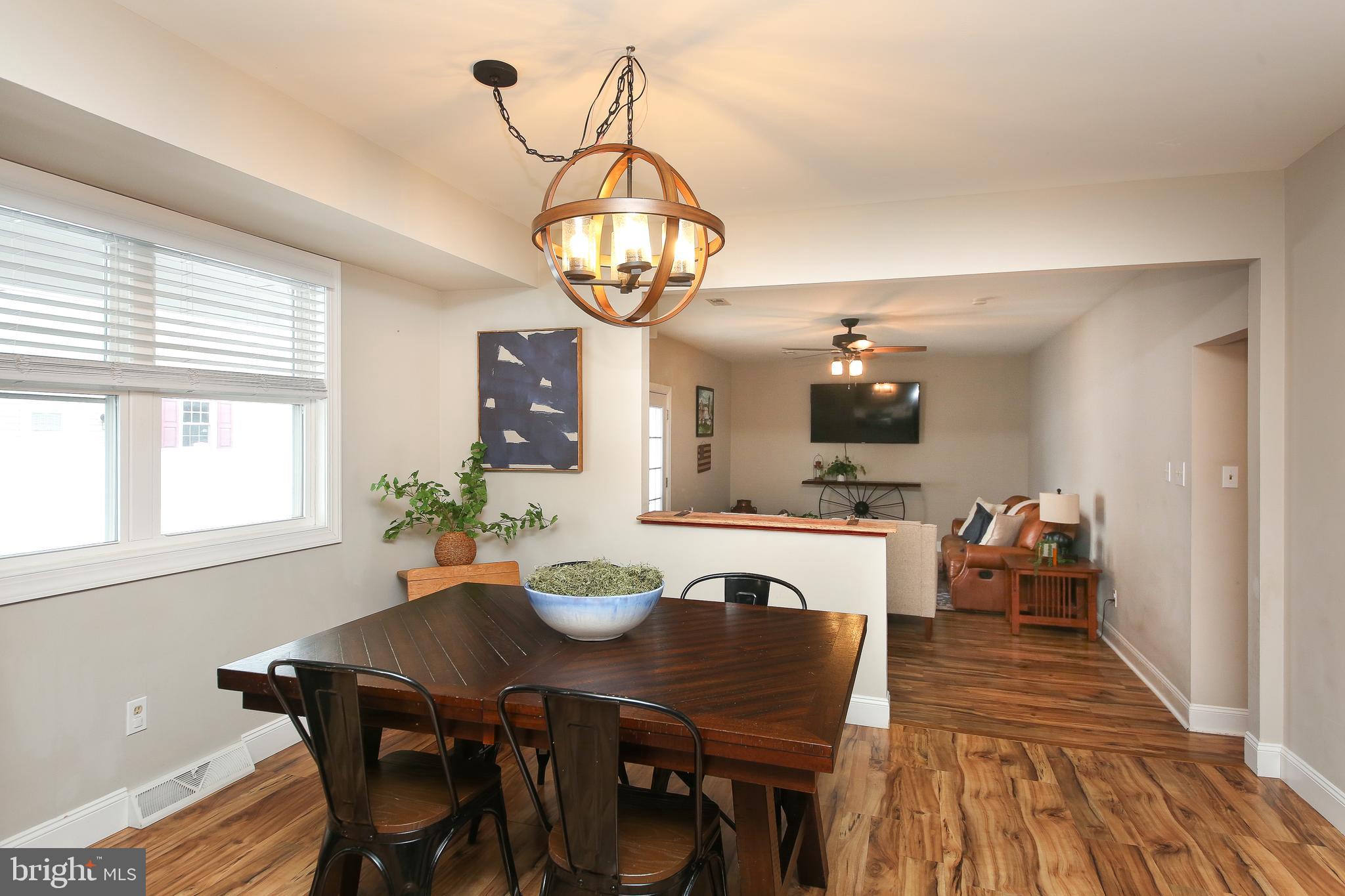 1148 Independence Way Hatfield, PA 19440 - Photo 11 of 33 a view of a dining room with furniture window and wooden floor