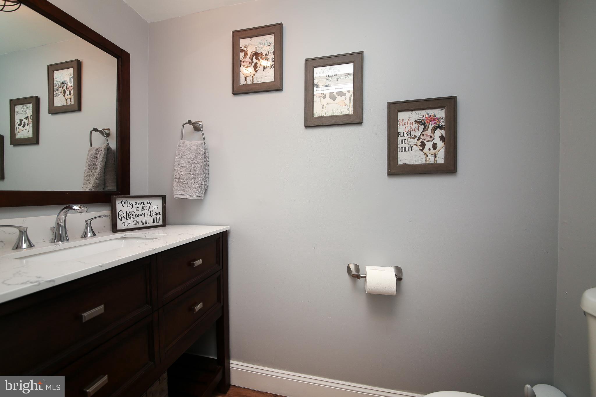1148 Independence Way Hatfield, PA 19440 - Photo 17 of 33 a bathroom with a toilet sink and mirror