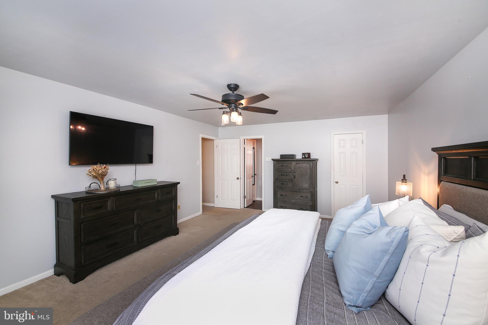 1148 Independence Way Hatfield, PA 19440 - Photo 19 of 33 a bedroom with a bed and a flat screen tv