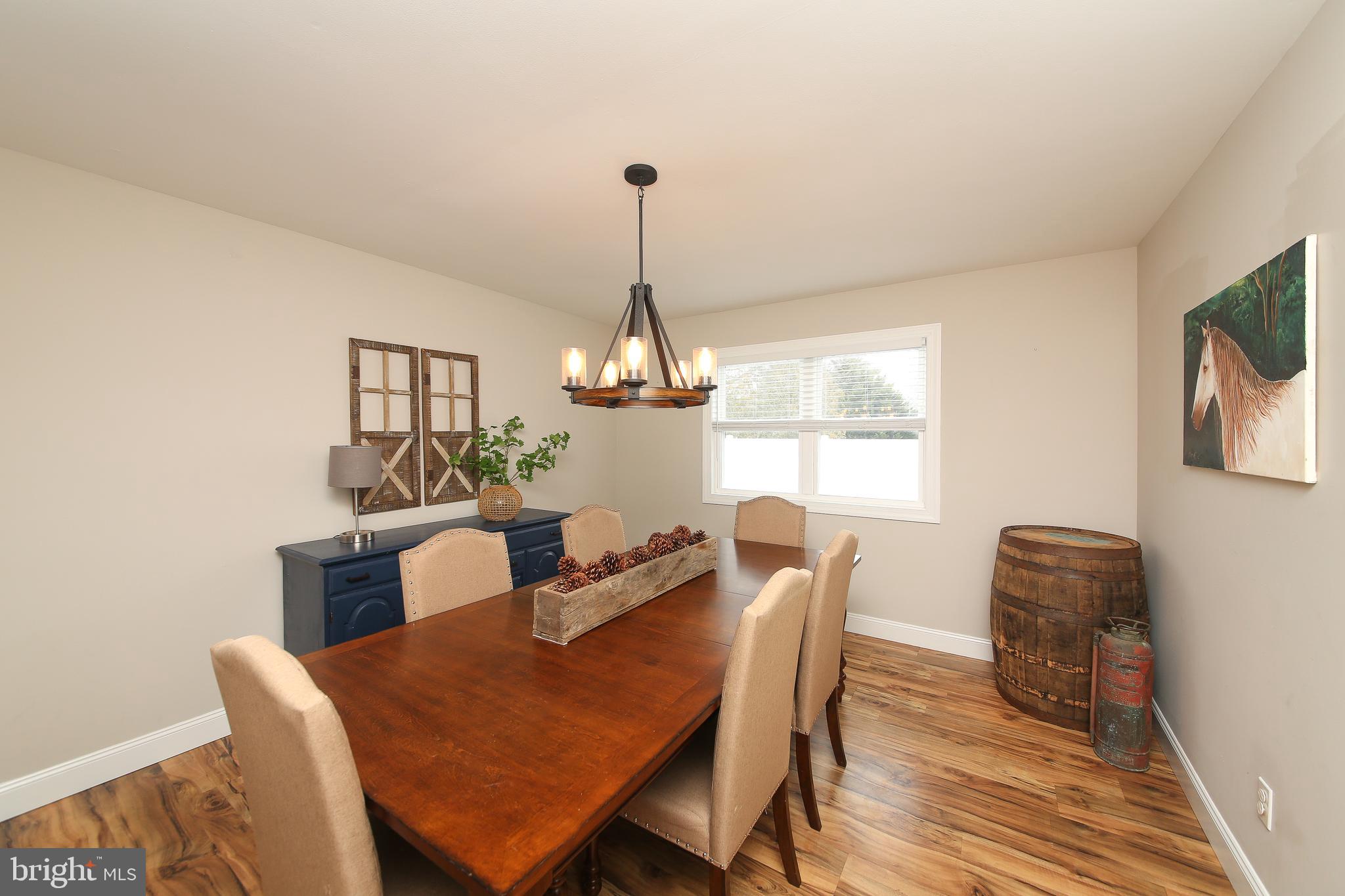 1148 Independence Way Hatfield, PA 19440 - Photo 7 of 33 a view of a dining room with furniture window and wooden floor