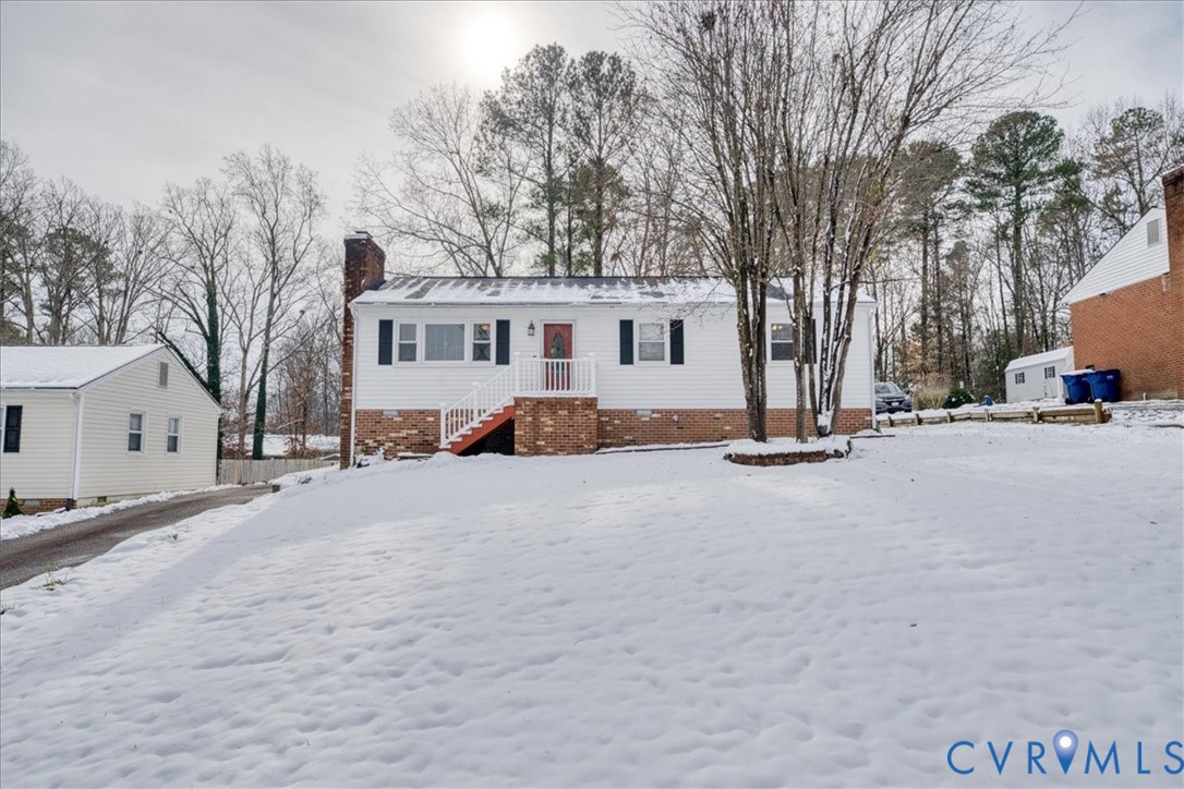 11201 Puckett Place Midlothian, VA 23112 - Photo 1 of 23 a view of a house with a snow in the road
