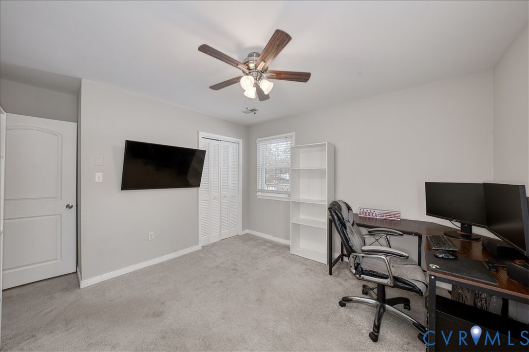 11201 Puckett Place Midlothian, VA 23112 - Photo 18 of 23 a view of a livingroom with workspace and a window