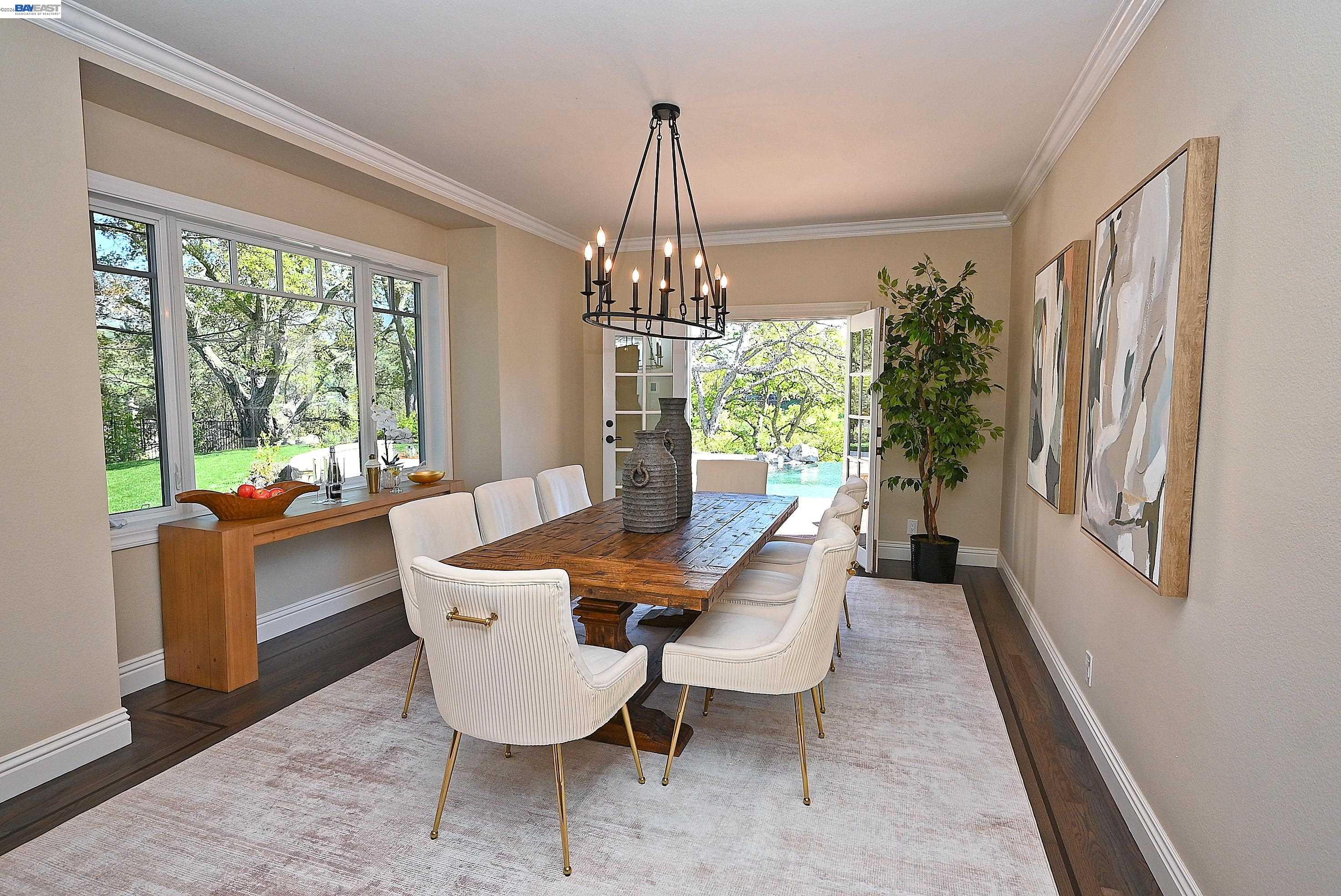 16 Ardendale Court Alamo, CA 94507 - Photo 17 of 58 a dining room with furniture a chandelier and wooden floor