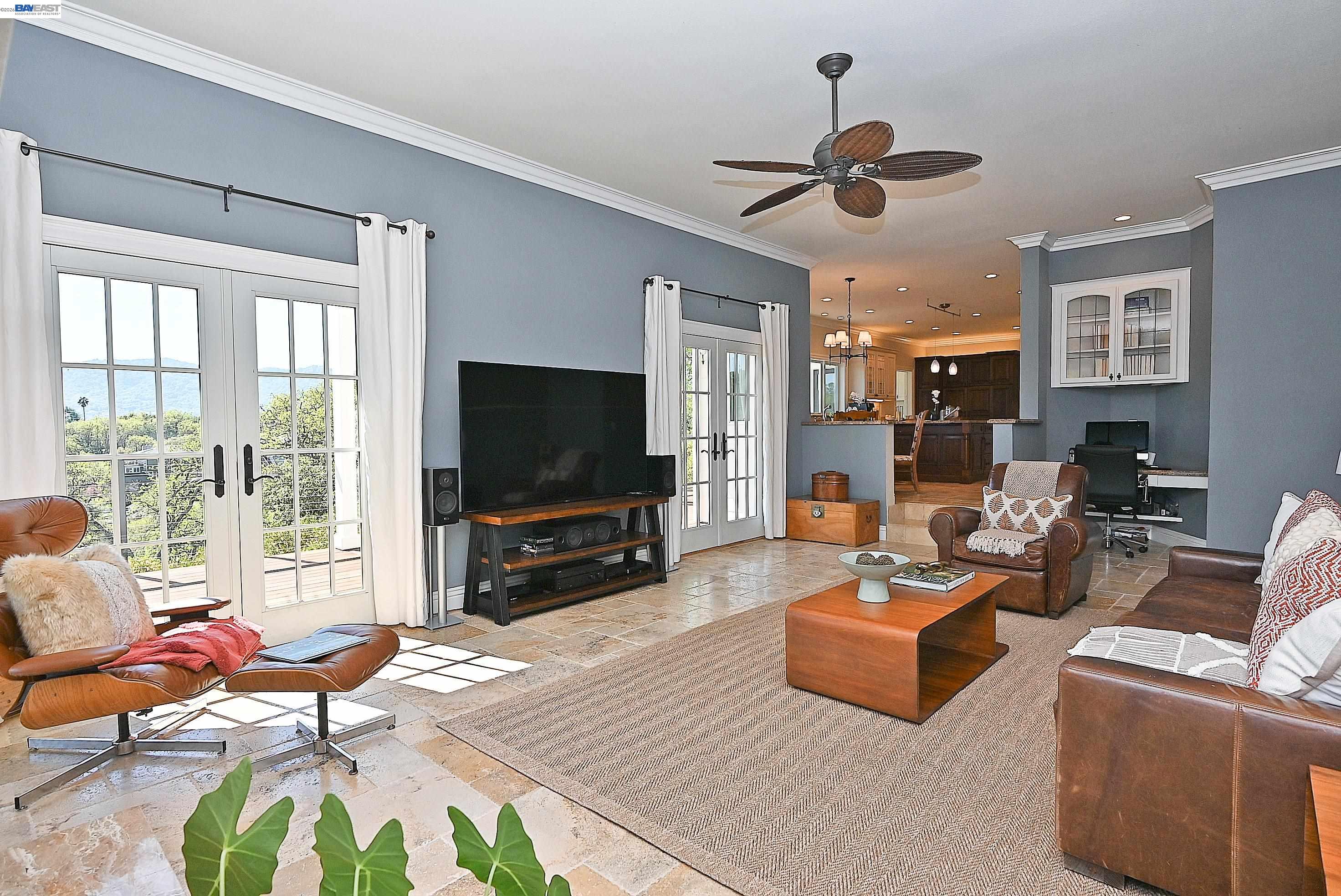 16 Ardendale Court Alamo, CA 94507 - Photo 22 of 58 a living room with furniture a flat screen tv and a large window