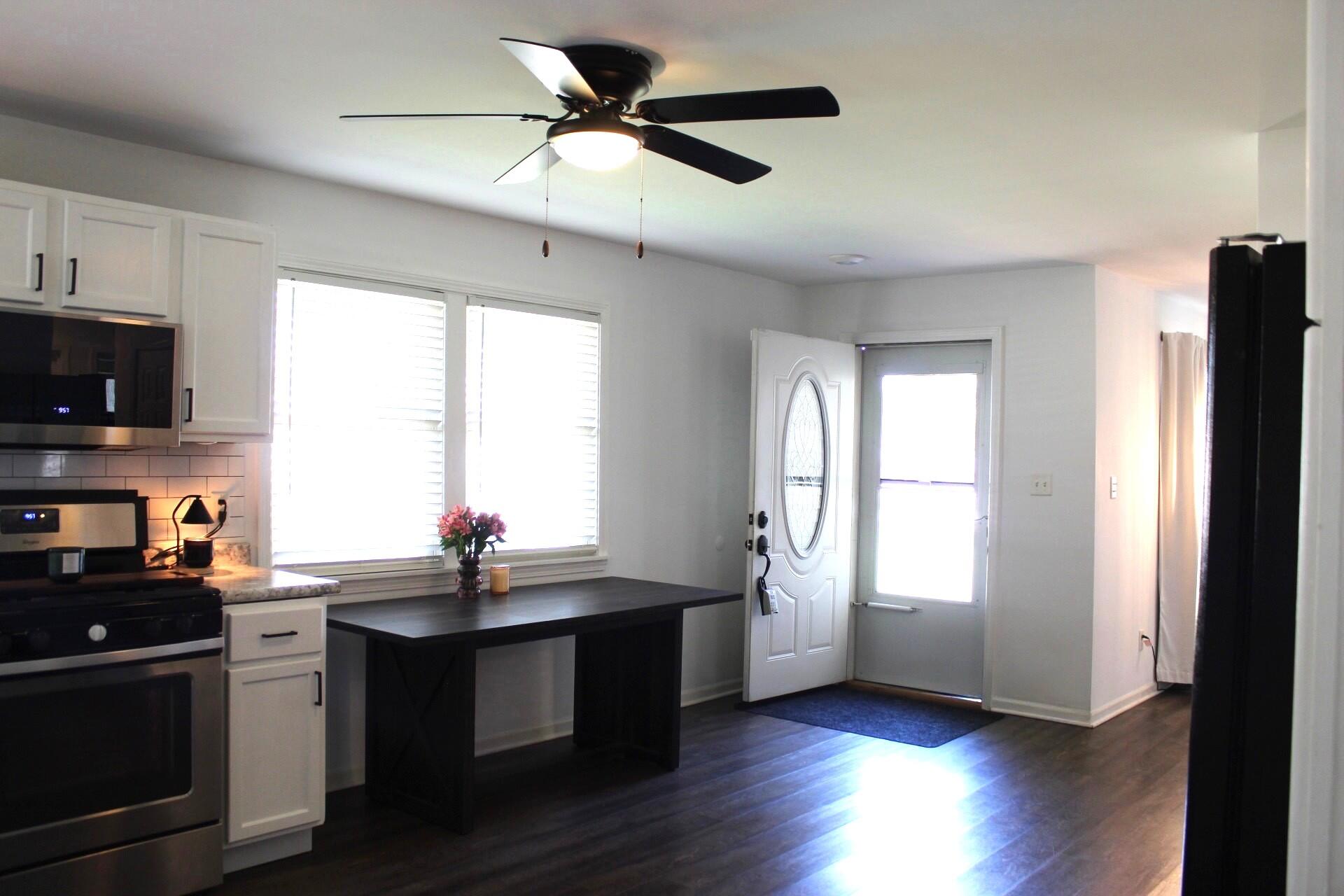 835 North Indiana Street Griffith, IN 46319 - Photo 9 of 19 a kitchen with a sink cabinets and window