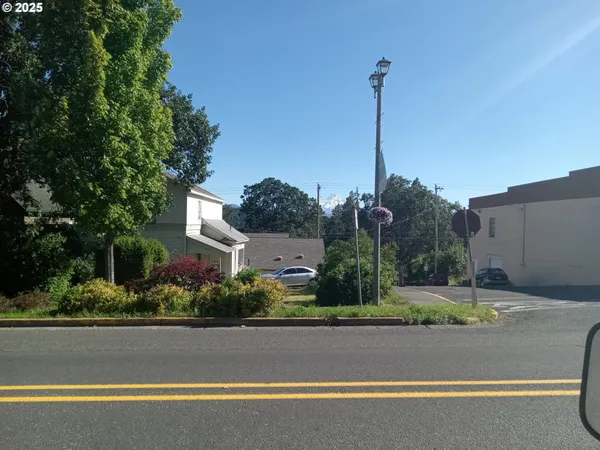 a house view with a garden space