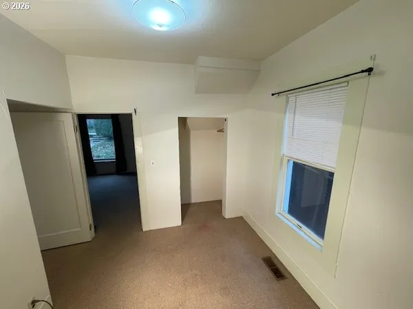 a car parked in front of a house