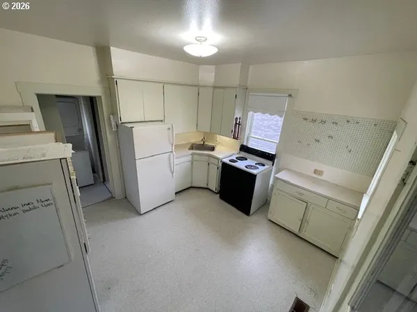 a bathroom with a toilet and a sink