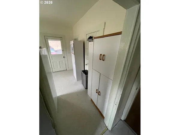 a workspace with furniture and a window