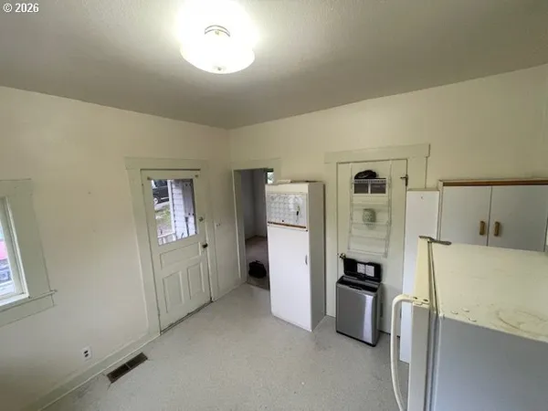 a view of a hallway with window