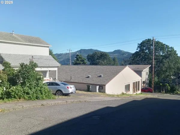 an aerial view of a house with a garden