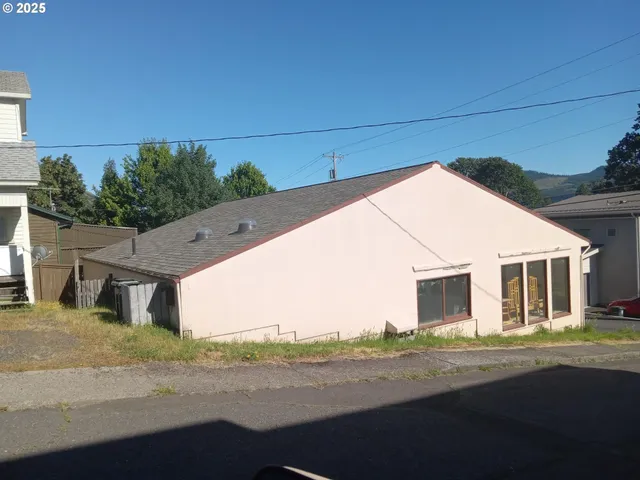 a view of a house with a street