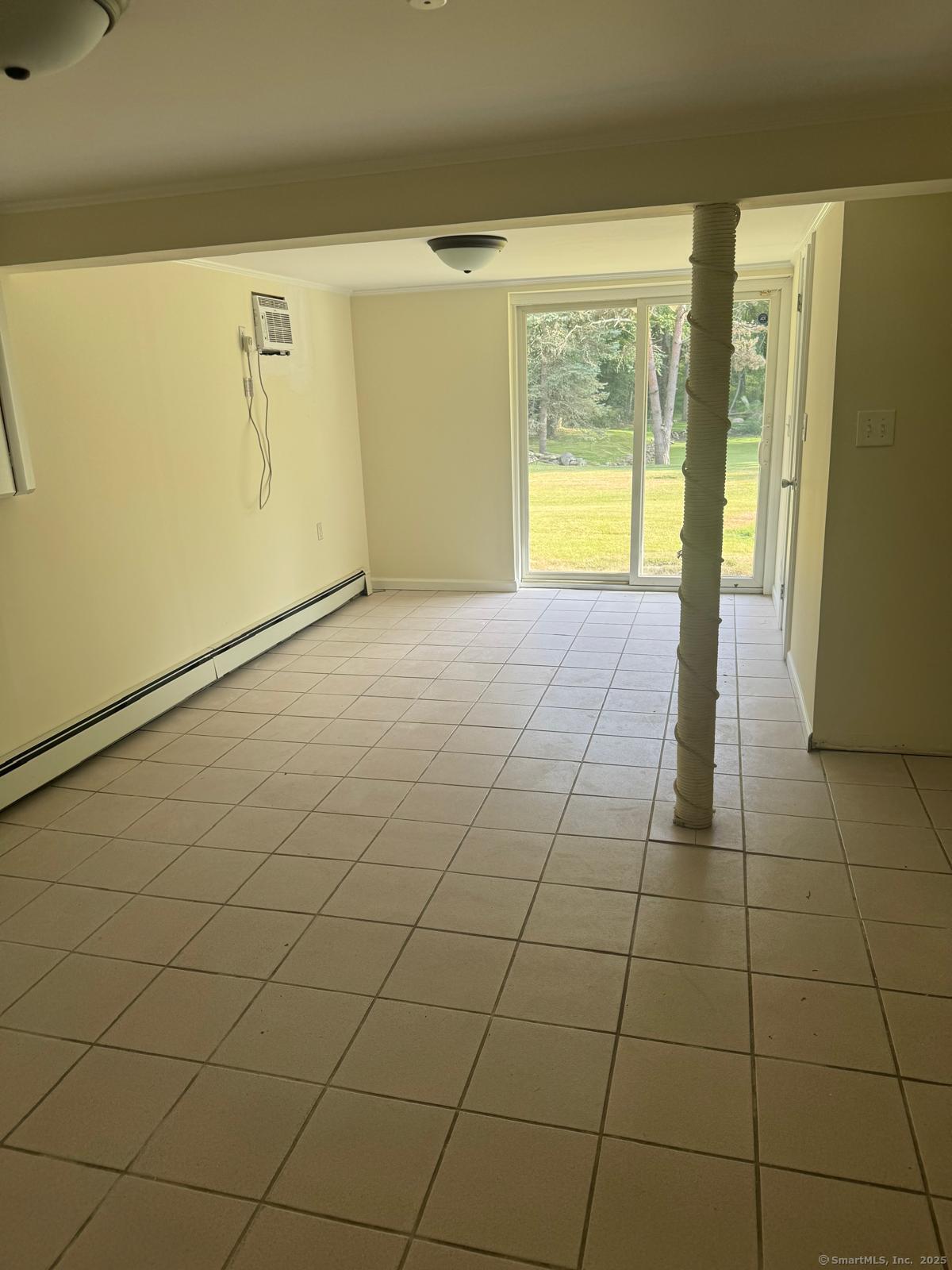 18 Hales Road Westport, CT 06880 - Photo 17 of 26 a view of an empty room with a window