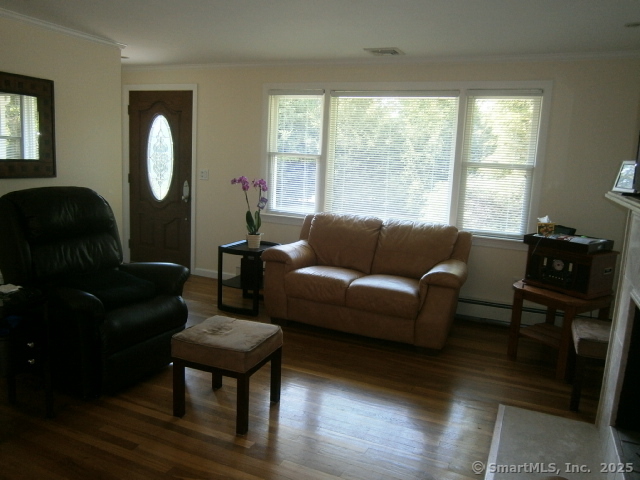 18 Hales Road Westport, CT 06880 - Photo 8 of 26 a living room with furniture and a large window