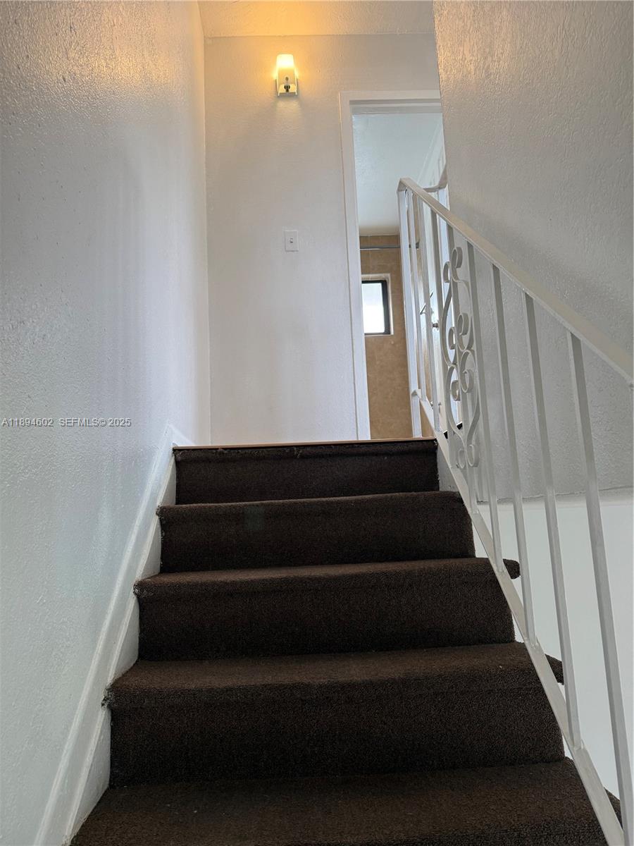 180 Northeast 71st Street, Unit 5 Miami, FL 33138 - Photo 7 of 12 a view of entryway